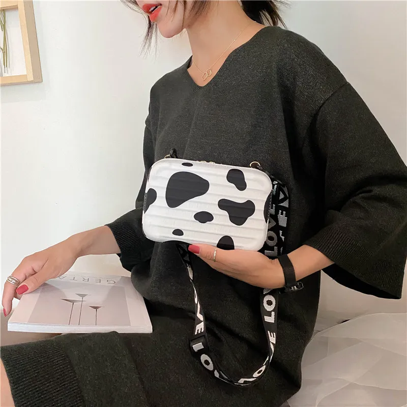 

Women bags 2020 cow print fashion clutch bag channels handbags cute white korean style women shoulder beach leather small purses