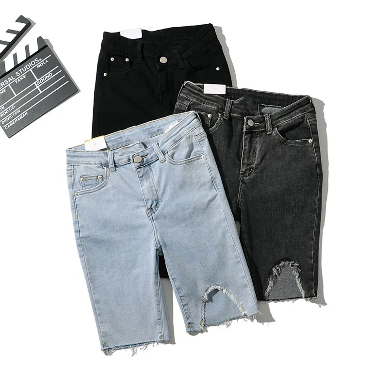 Женские рваные джинсовые шорты однотонные Асимметричные эластичные с высокой
