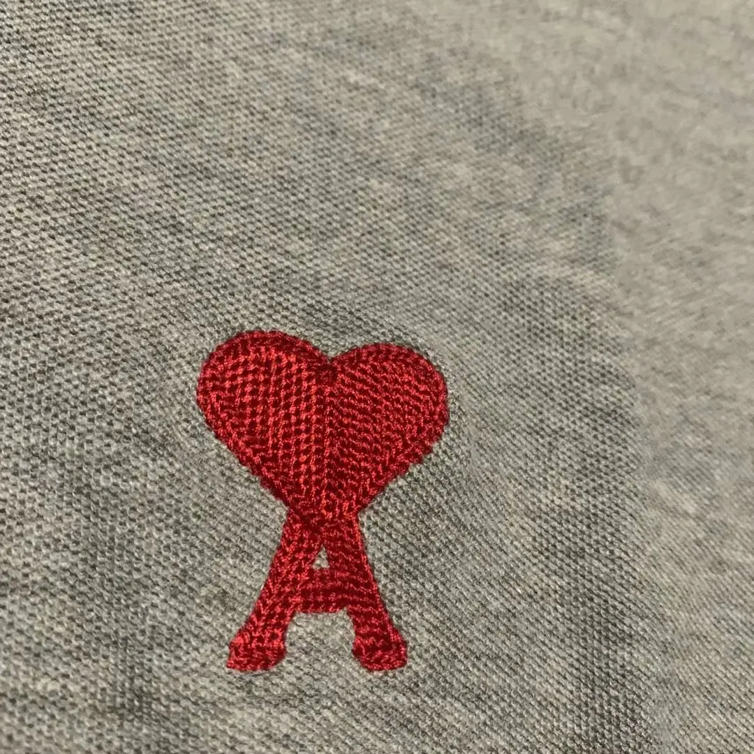 

A heart men's Cotton tide brand logo fashion summer men's short sleeve polo shirt Amy