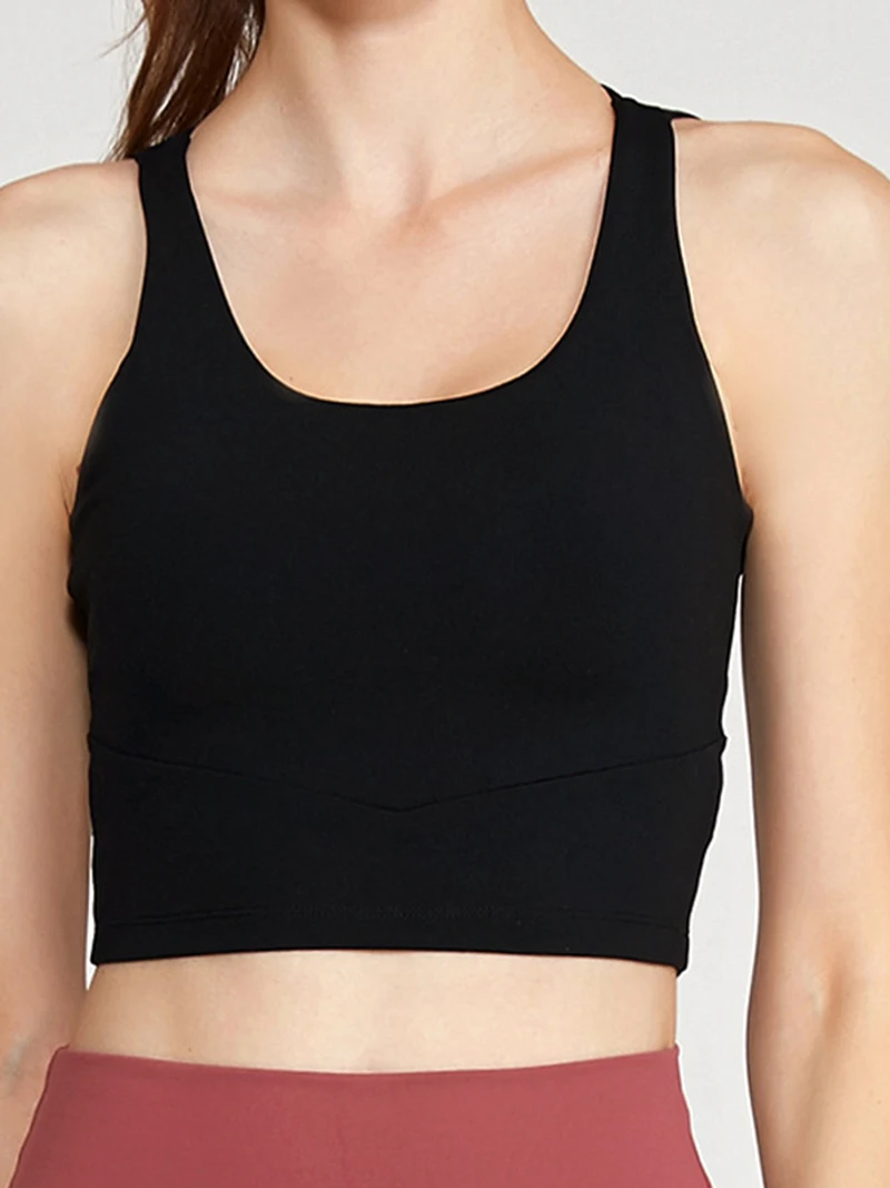 

Women's nylon spandex solid color nude yoga sports bra cross beautiful back shockproof gathering fitness vest small sling
