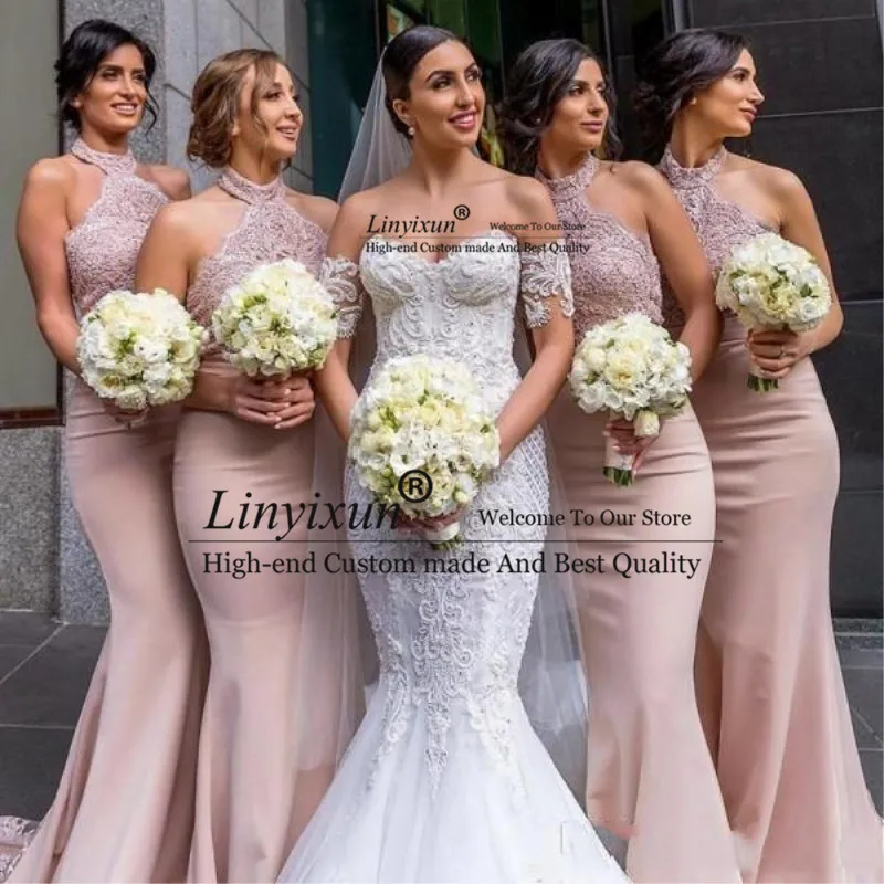 

Sexy Blush Pink Lace Appliqued Mermaid Bridesmaid Dresses Cheap Halter Backless Wedding Guest Gown Long Formal Evening Gowns