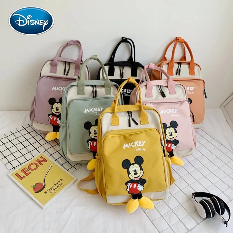 

Disney Mickey Doll Diaper Bag Baby Backpack Oxford Cloth Hand-held Shoulder Large Capacity Cartoon Minnie Mickey Mouse Schoolbag