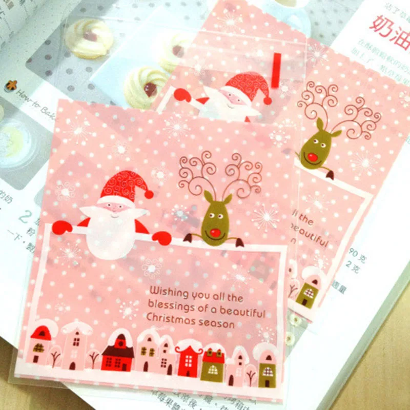 

50pcs/lot Christmas Frosted Pink Town Handmade Cookie Bag Cartoon Santa Reindeer snowflake DIY Cellophane Self-Stick Goodie Bags