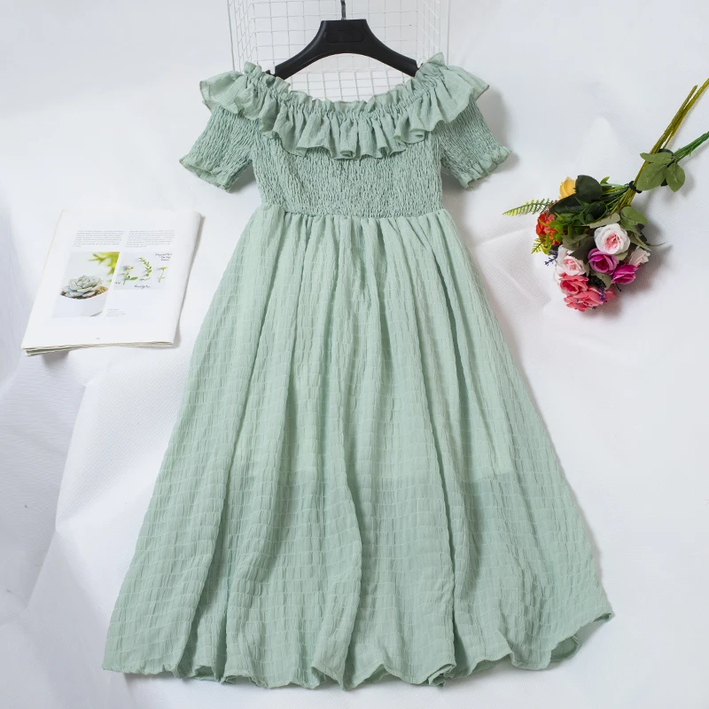 Элегантное женское летнее платье с вырезом лодочкой и расклешенными рукавами