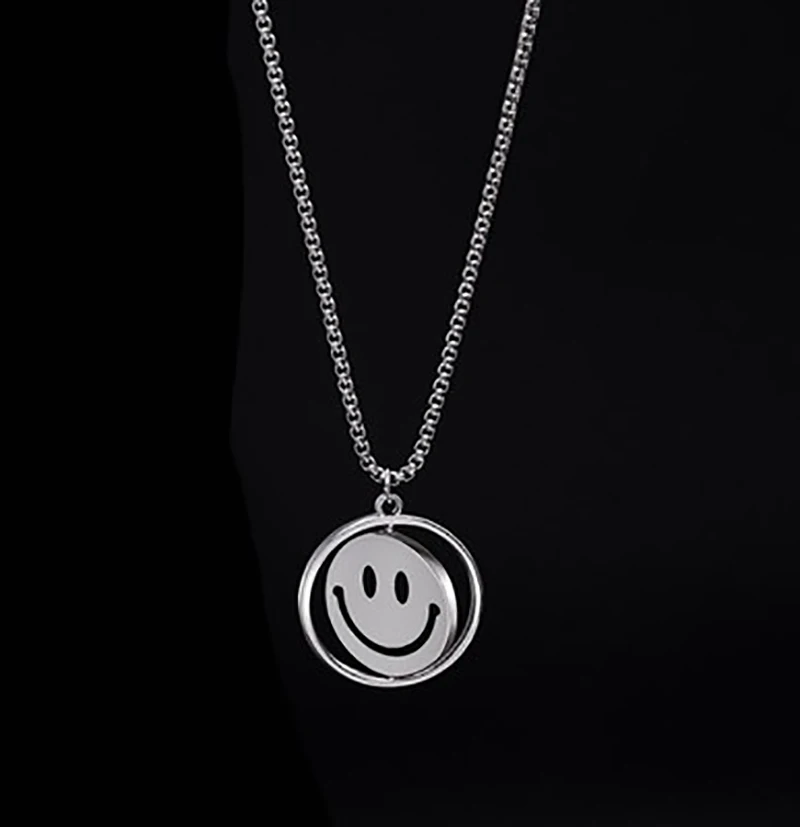 

Simple men and women rotating smiling face pendant retro personality hip-hop couple rotating cry face necklace