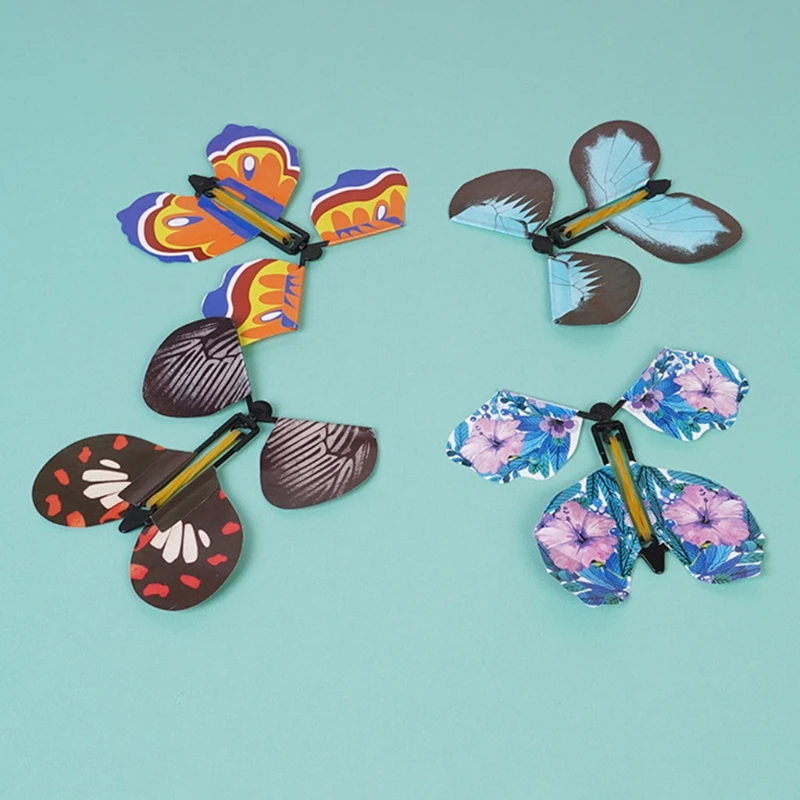 

G2AD 10 Pcs Flying in the Book Fairy Rubber Band Powered Wind Up Butterfly Toy Funny Gift