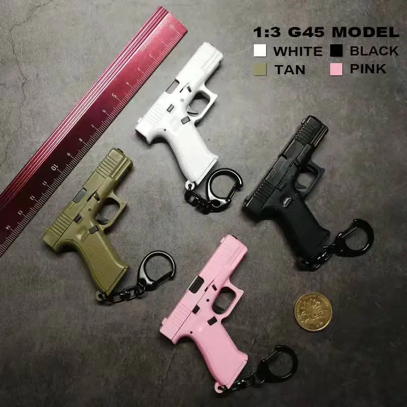 

Mini G45 Keychain Portable Pistol Gun Shape Tactical Plastic Guns Keychain Ring Holder Weapon Home Decorations Set For Keys Bags