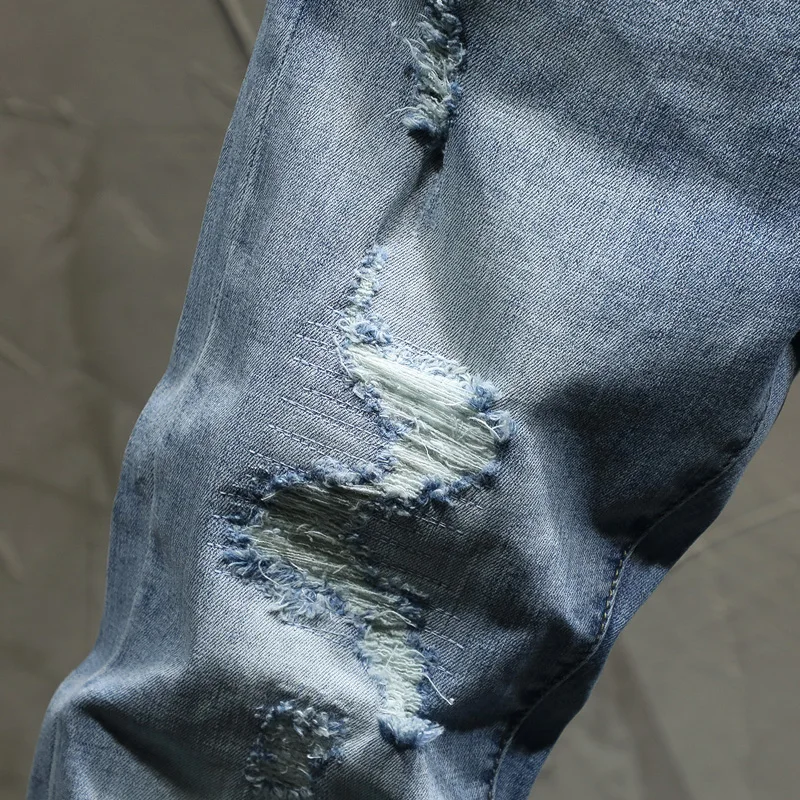 Джинсы мужские рваные узкие Брендовые брюки из денима стрейч светло-голубого