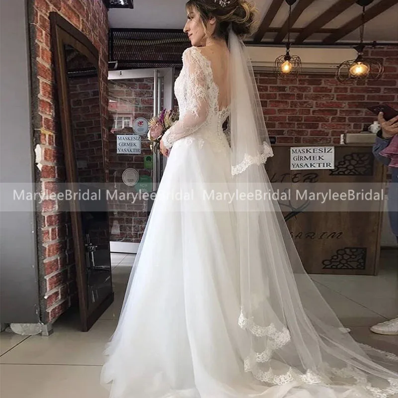 

Sexy Bohemian Wedding Dresses With Long Sleeves Deep V Neck Mariage Romantic Lace Beach Bridal Gowns Backless Vestido De Noiva