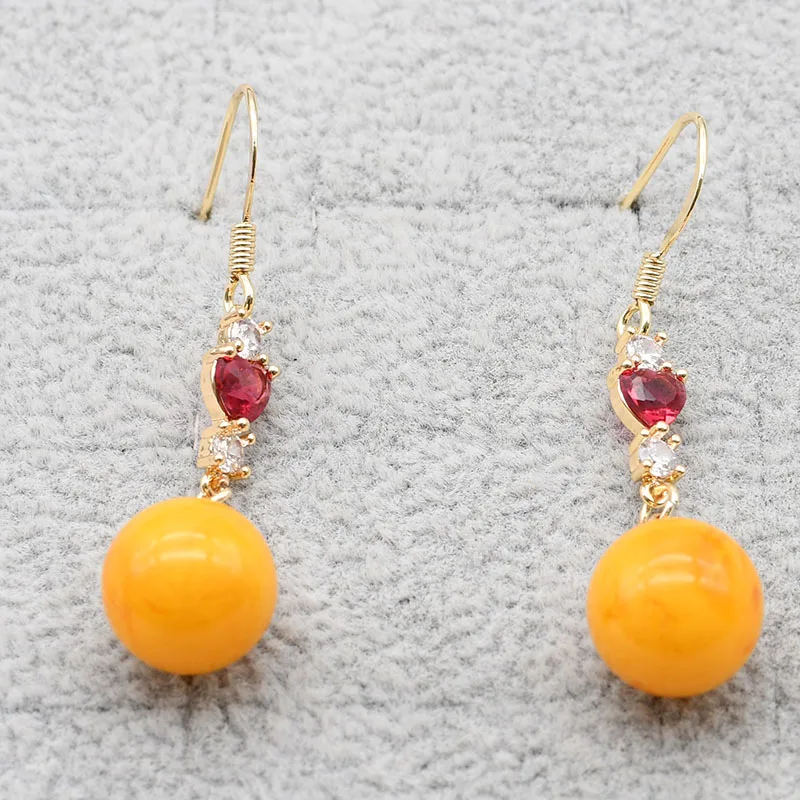 

Lady's new earrings, round beeswax and heart crystal pendant, elegant