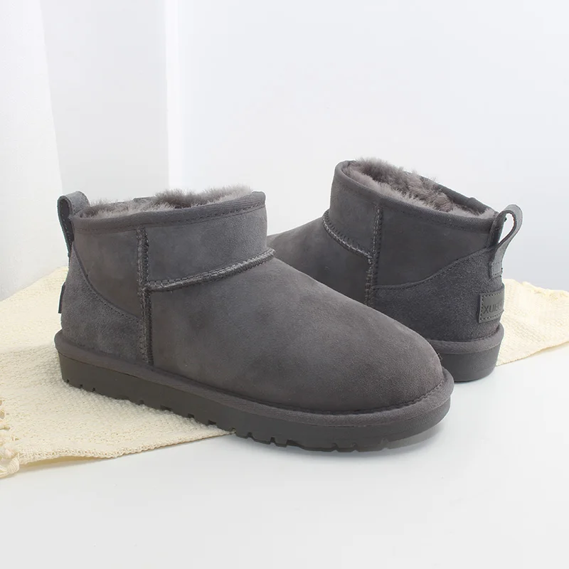 

2020 winter snow boots sheepskin wool integrated cotton boots women's bare ankle winter boots women's warm shoes flat bottomed a