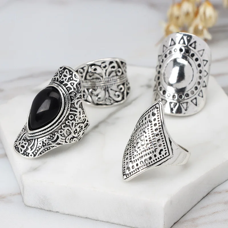 

4 Pcs Vintage Ethnic Wind Drop Palace Openwork Carved Sun Rings
