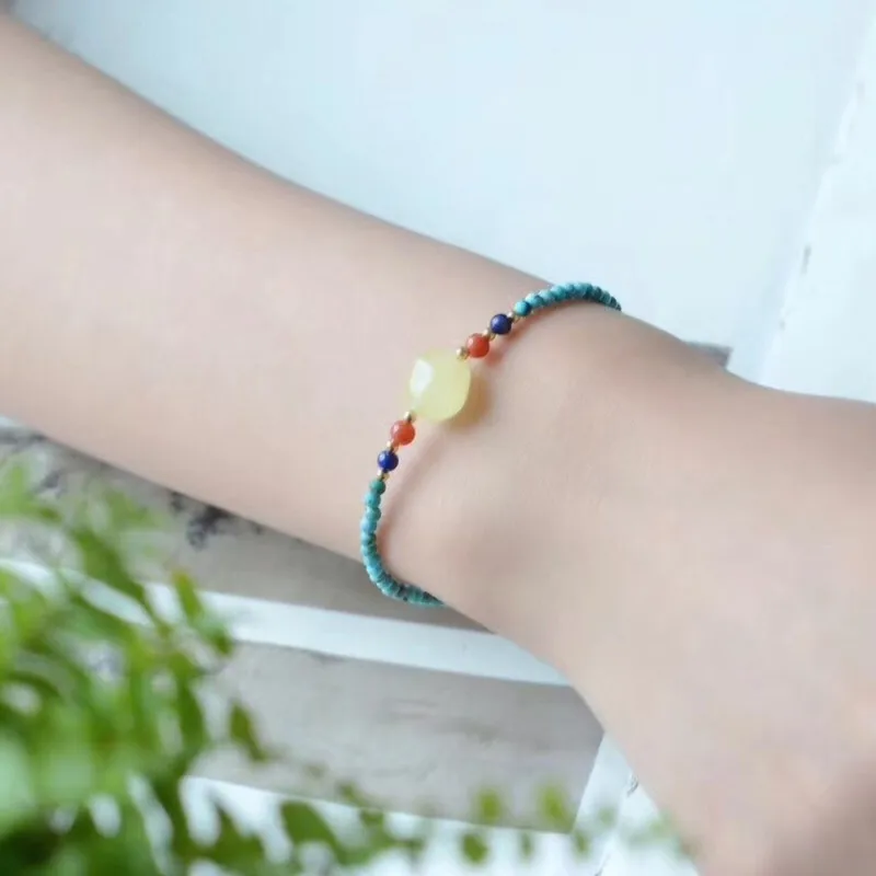 

Natural turquoise bracelet with beeswax Round bead