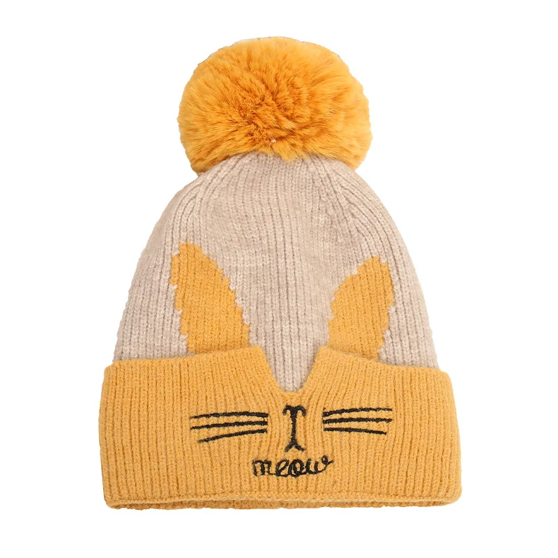 

Knitting edge hair bulb cap female cartoon embroidered hat color matching autumn/winter wool warm earmuffs baotou cap