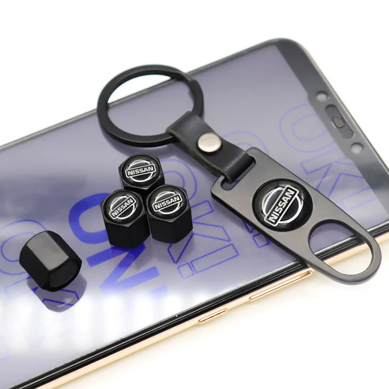 

Car parts 4 car tire valve caps car dust caps and small wrenches can be used as key rings at the same time suitable for NISSAN-