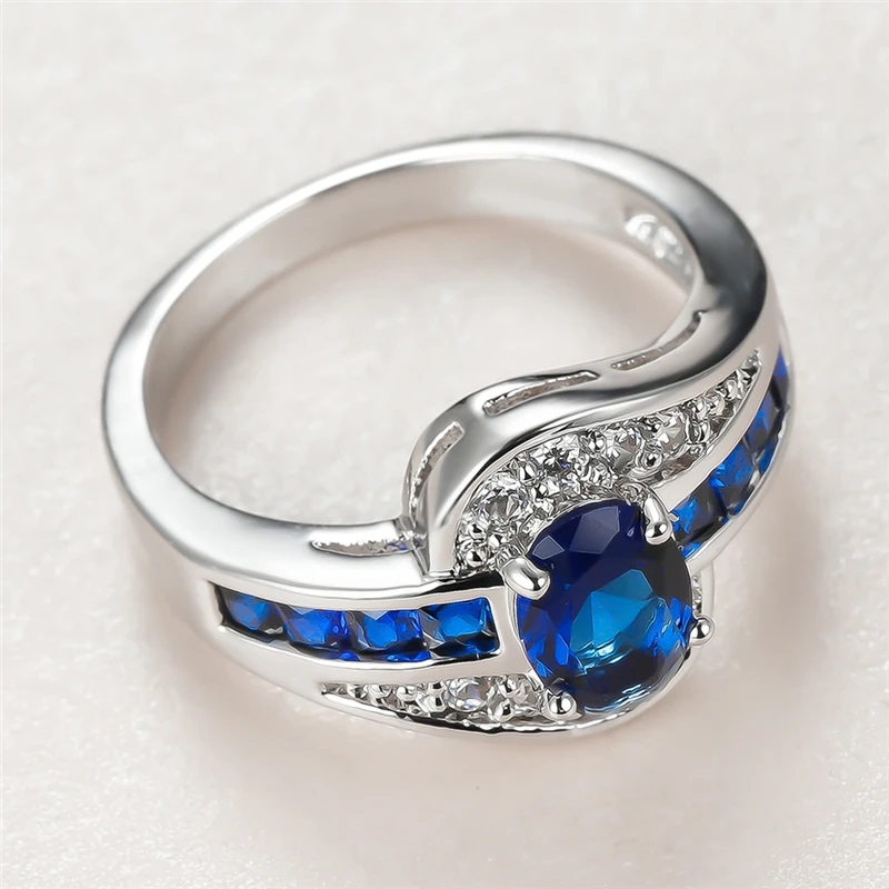 

Trendy Male Female Blue Crystal Stone Ring Charm Silver Color Wedding Rings For Women Dainty Bride Oval Zircon Engagement Ring