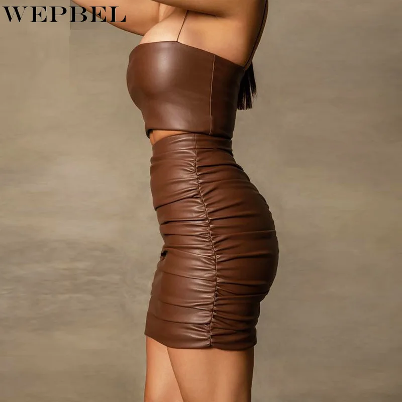WEPBEL-Conjunto de dos piezas de cuero sintético para mujer, Top corto con tirantes y minifaldas de cintura alta, ropa Sexy para fiesta y discoteca, 2021