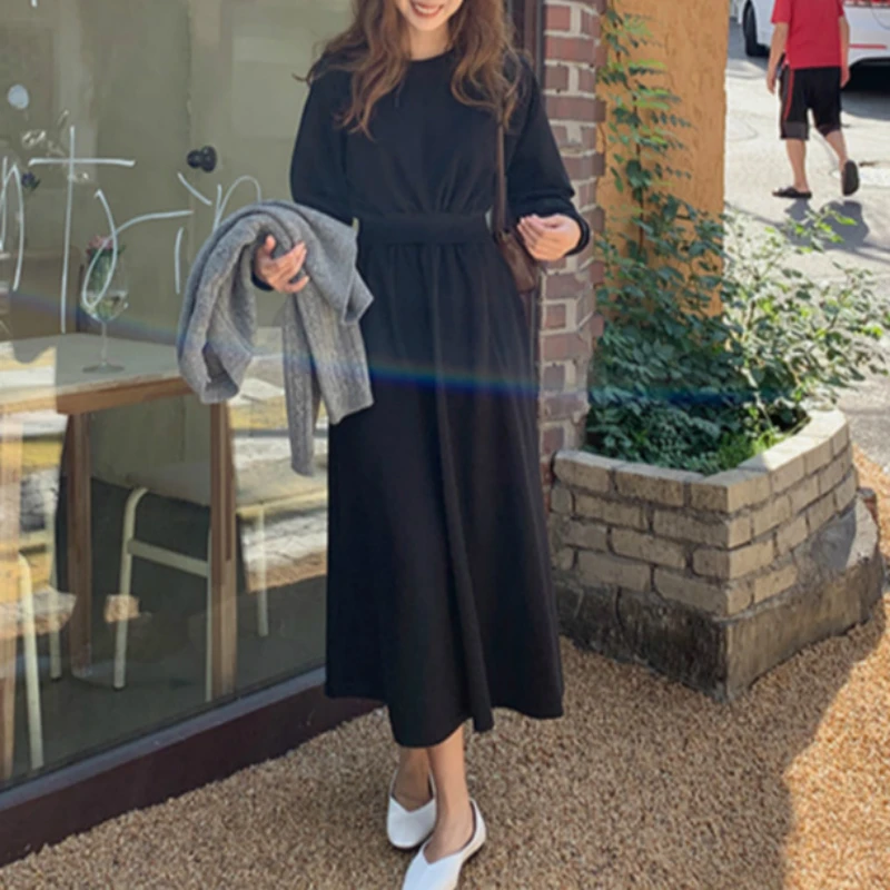 Женское длинное платье с капюшоном черное свободное трапеция высокой талией и