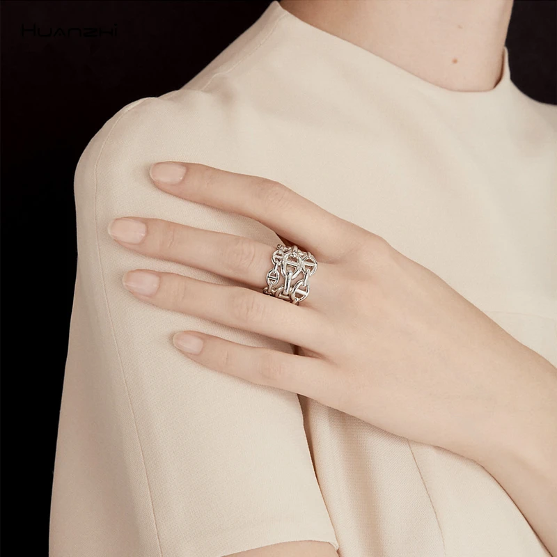 HUANZHI New Trend Curve Hollow Line Three Rows Wide Face Pig Nose Modeling Adjustable Rings For Men Women Party Jewelry
