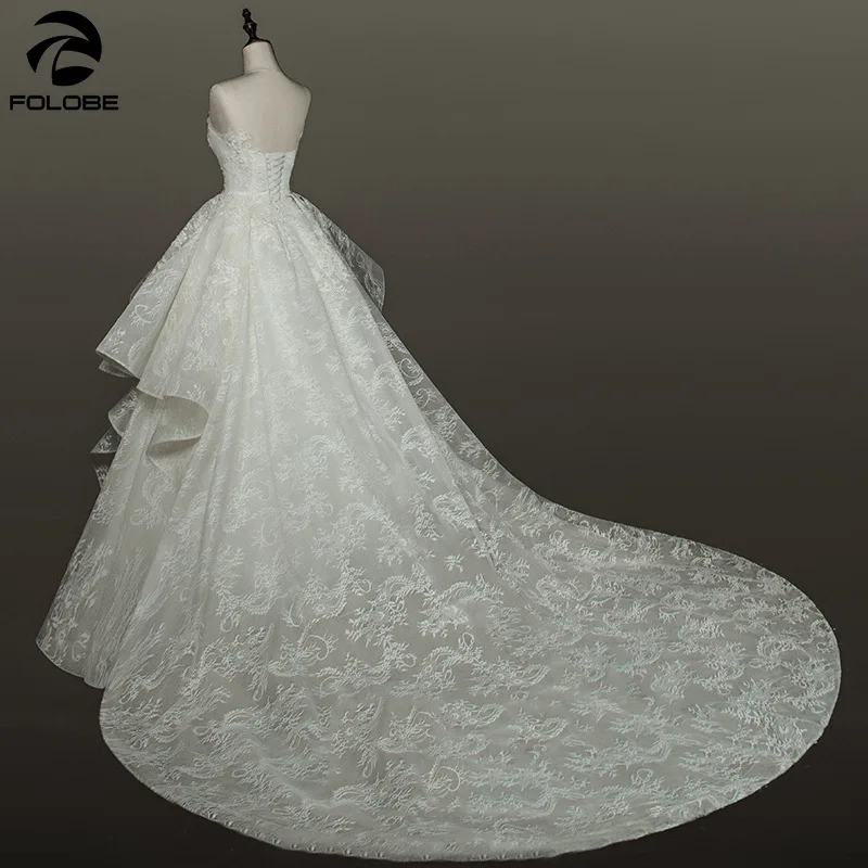 Бальное платье с оборками кружевное свадебное принцессы глубоким вырезом