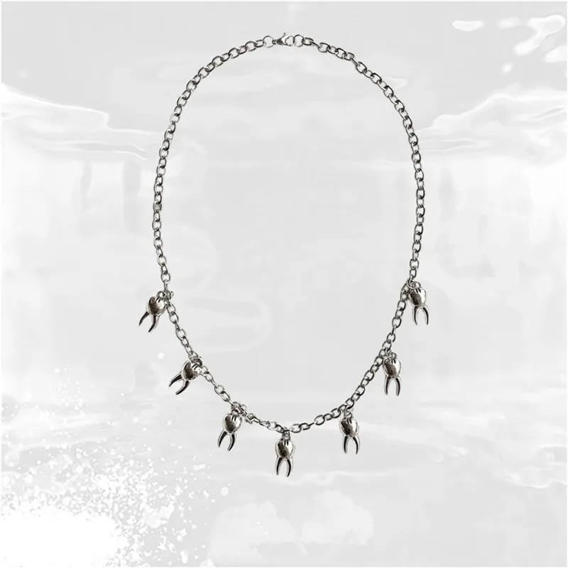 Фото Сказочное ожерелье с зубами античный серебряный цвет Харадзюку готический
