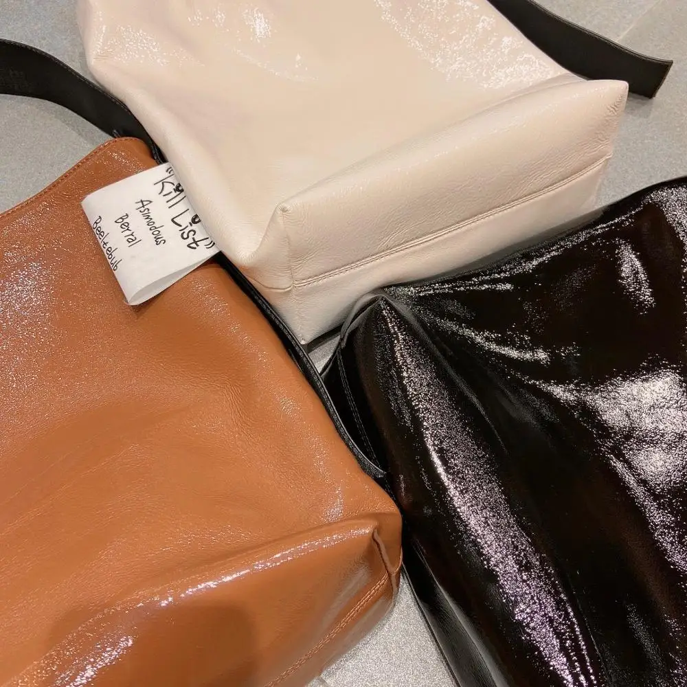 New super-a soft leather armpit top layer cowhide commuting fashion high sense atmosphere large capacity handbag |