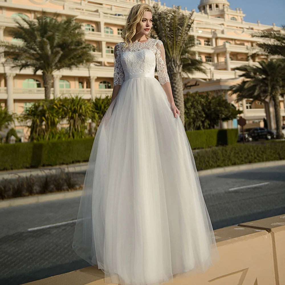 

Элегантное Тюлевое свадебное платье-трапеция с круглым вырезом, рукавом до локтя, открытой спиной и кружевной аппликацией, свадебные наряд...