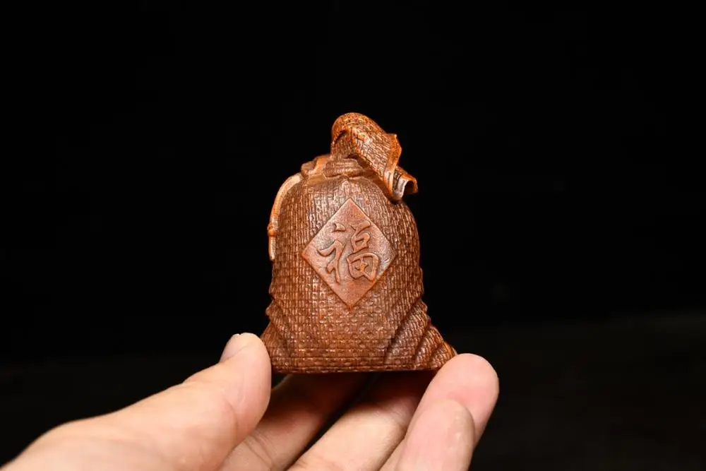 

Home Decor 3" China Collection Old Boxwood Money bag statue Carved money bag Implication Extra cash