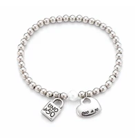 new stainless steel bracelet simple retro lock hollow heart peach heart men and women pearl bracelet uno 50 jewelry gifts