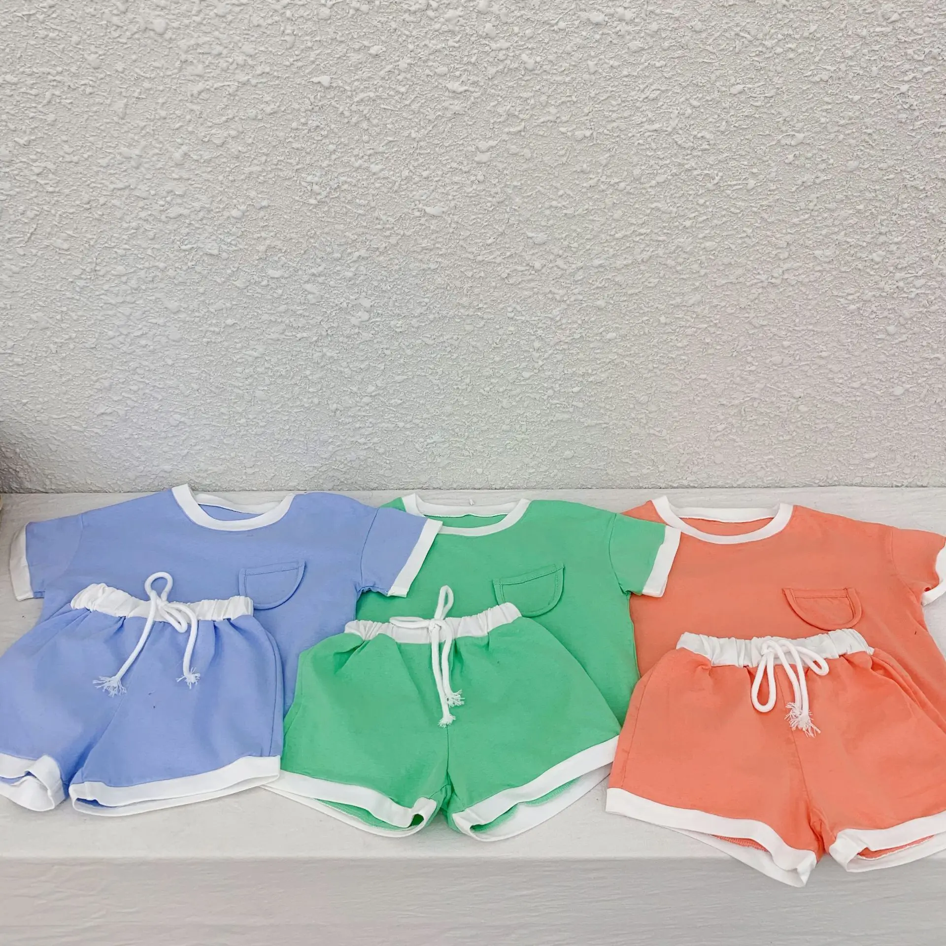 Комплект детской одежды весна лето 3169 2020 Корейская одежда с карманами Однотонная