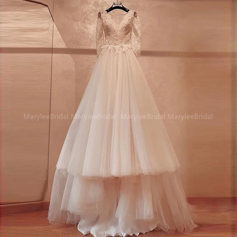 Элегантные свадебные платья трапециевидной формы с длинным рукавом и шлейфом