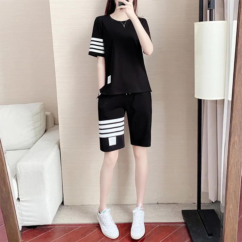 

Комплект спортивной одежды для мужчин и женщин, свободная футболка-шаровары, повседневные футболки и шорты большого размера, комплект из дв...