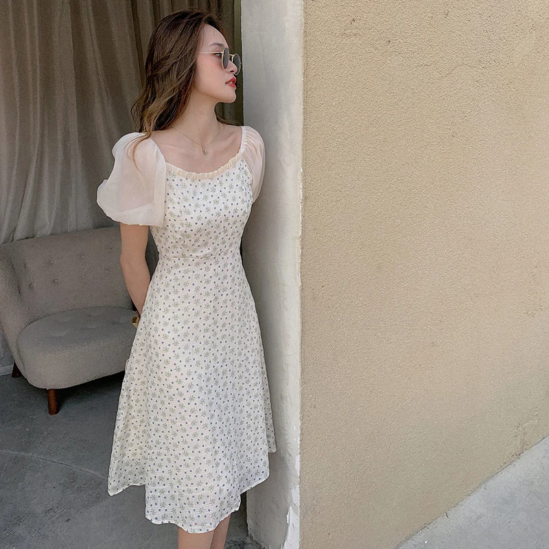 

Make the new summer floral dress female small pure and fresh and splicing hubble-bubble sleeve long dress