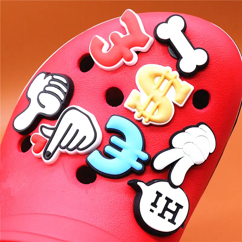 1pcs Shoe Charms Bone PVC Croc Accessories Decorations Dollar Euro Franc Sign Gesture JIBZ Charm Buckle for Kids Party Xmas Gift