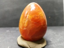 102.6gNatural color red agate egg polishing quartz crystal healing stone, furniture accessories