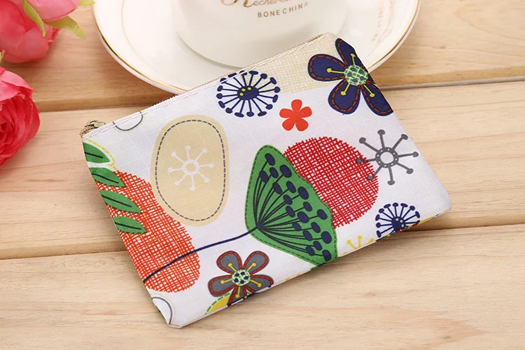 

Polyester ladies coin purse keychain snack bag USB cable earphone bag mini cute oval zipper cartoon simple girl coin purse