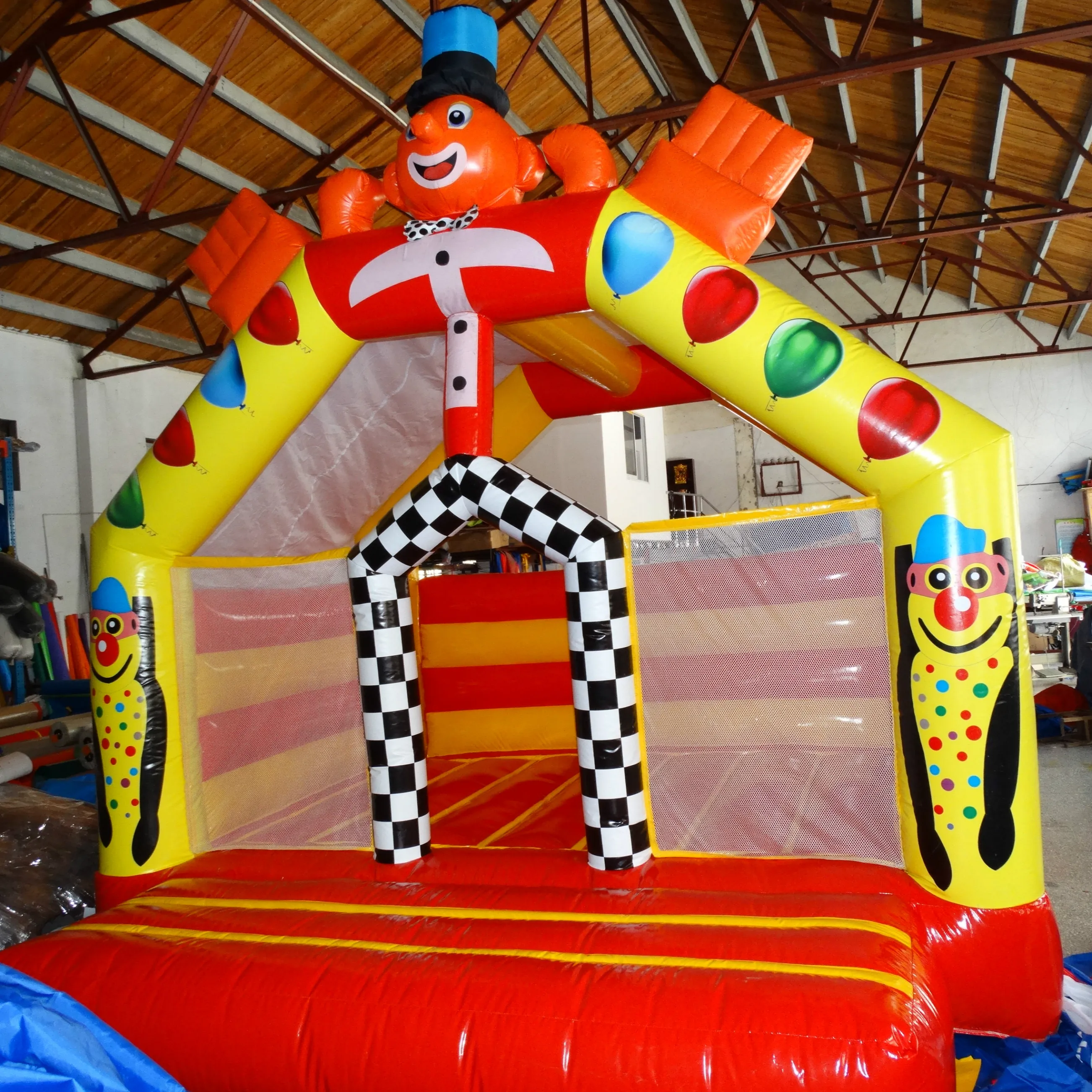 

Inflatable bounce house trampoline kids jumping on play ground in amusement park center