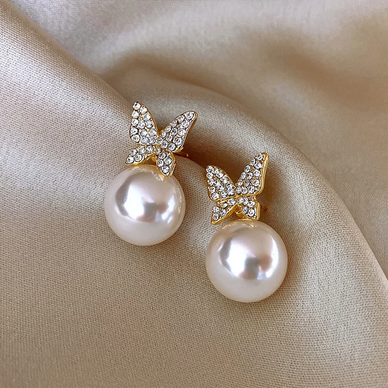 

Cute Female White Pearl Stud Earrings Gold Color Peary Earrings Vintage Crystal Butterfly Wedding Earrings For Women