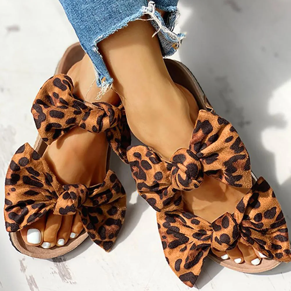 cow print double bow sandals