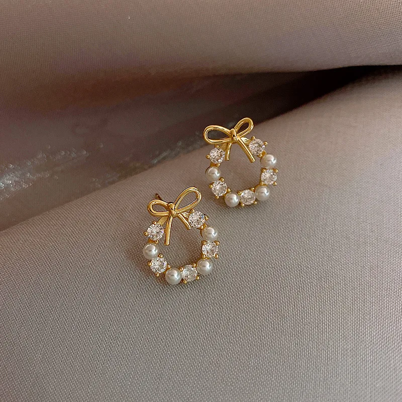

Wreath of pearl earrings bowknot earrings 2021 new tide temperament of south Korean web celebrity hot style earrings