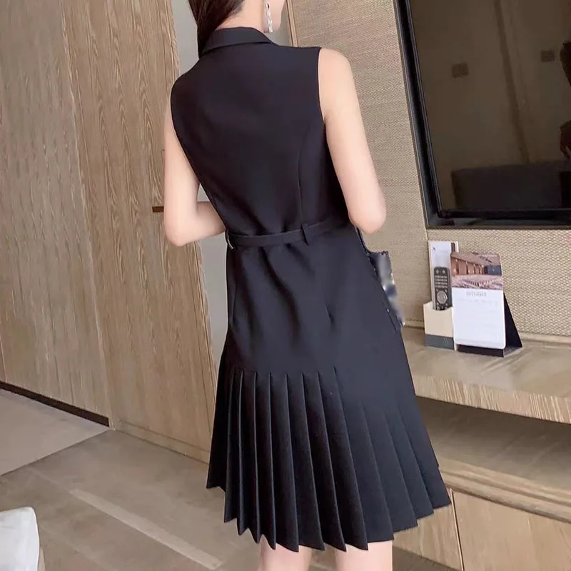 

ECRURANI Patchwork Solid Dress For Women Notched Sleeveless Button Sashes Pleated Midi Dresses Female New Clothing 2021 Summer