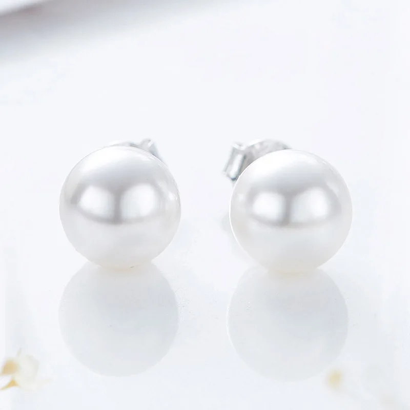 Серьги-гвоздики женские из серебра 925 пробы украшенные кристаллами в форме шара