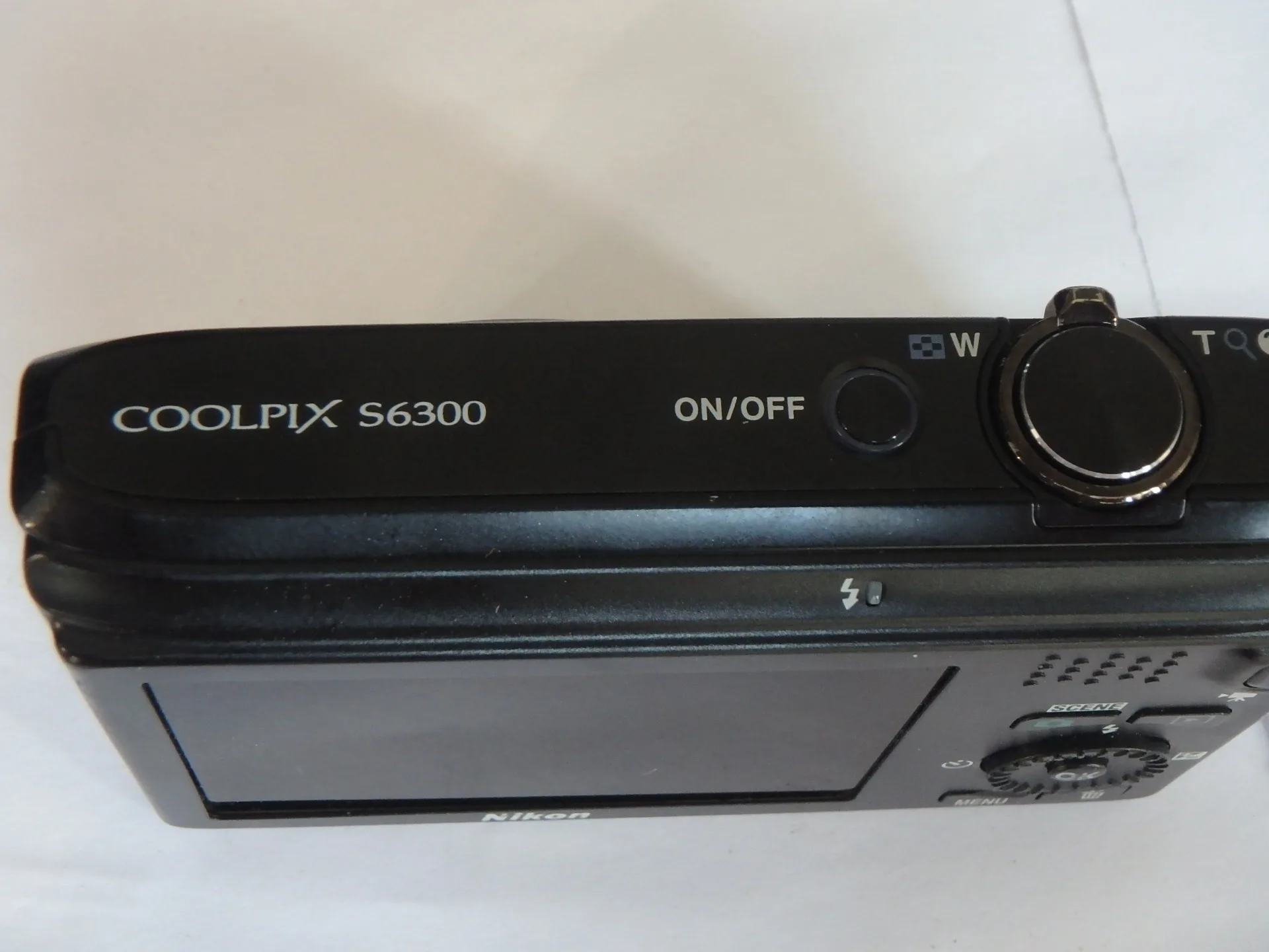 

USED Nikon COOLPIX S6300 16 MP Digital Camera with 10x Zoom NIKKOR Glass Lens and Full HD 1080p Video