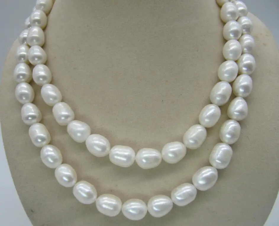 

Natural 32 inch 9-10mm South Sea White Pearl Necklace 14k yellow gold clasp