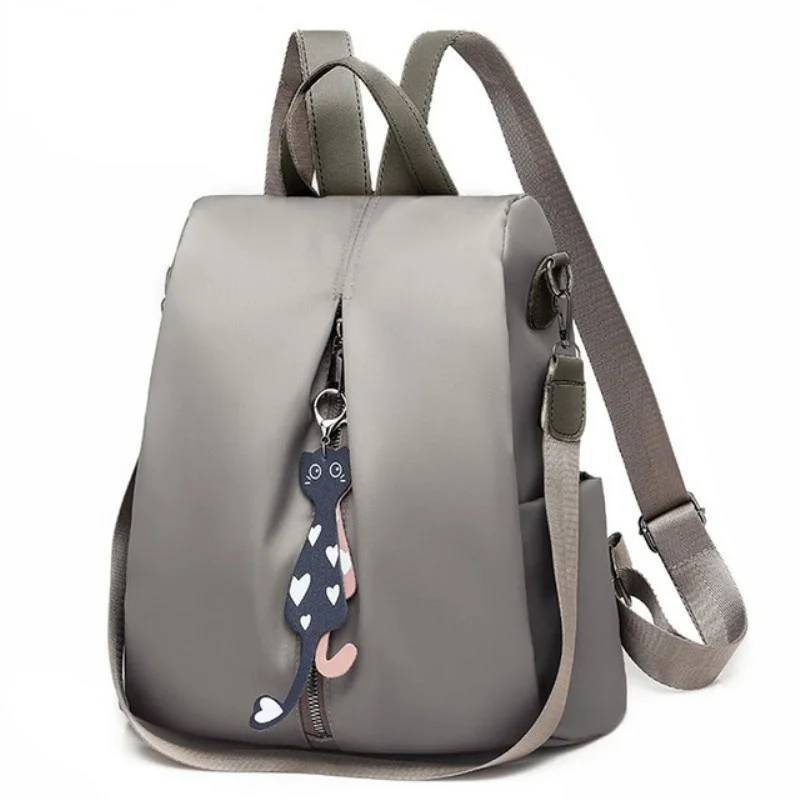 

Multi-use Nylon Backpack Solid Color Large Daypack for Female Bagpack with Cat Pendant Women Simple Travel Shoulder Bags Pack