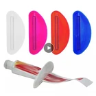 Пластик устройство для выдавливания тюбика диспенсер хэндс-фри Squeeze диспенсер разные цвета Портативный прокатки дозатор зубной пасты Ванная комната инструменты