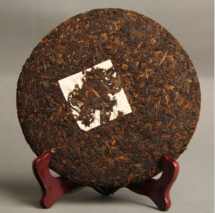 Сделано в 2011 году созревший чай Китай Юньнань пух три высокопрозрачных огня