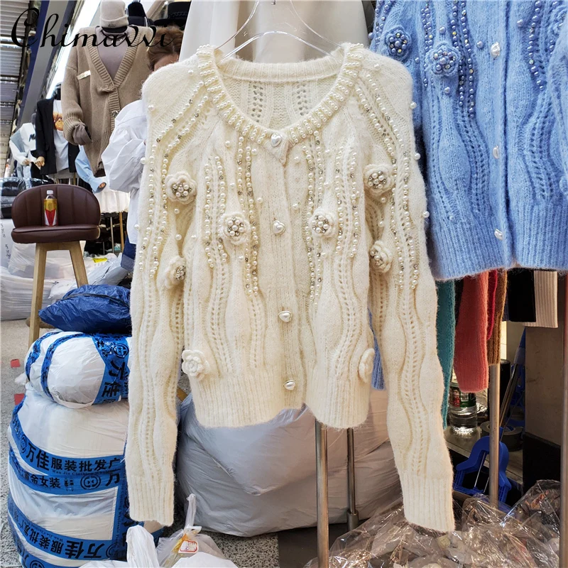 

2021 New Fall Female Lightly Mature Heart Buckle Sweater Cardigan Coat Women Fashion Elegant Solid Pearl Flower O-neck Sweater