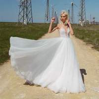 ranmo beach wedding gown illusion tulle a line beaded v neck sleeveless bridal dress zipper up sweepbrush sexy wedding dress
