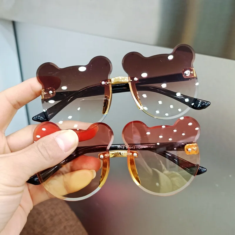 

Hot Cute Kids Bow Sunglasses Cool Girls Boys Unique Mickey Shape Rimless Clear Ocean Lenses Eyewear Children Outing Decoration